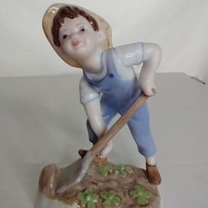 Royal Worcester Saturday's Child boy figurine.